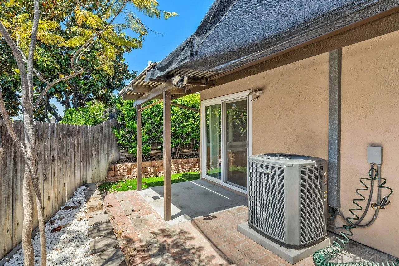 14215 Sutter Mill Way Poway, CA 92064 - Photo 28 of 38 a view of a porch with wooden fence