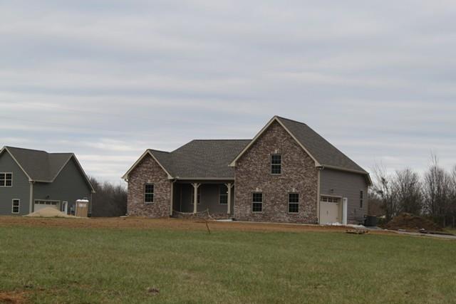 5548 Flewellyn Road Springfield, TN 37172 - Photo 2 of 16 a front view of house with yard and trees in the background