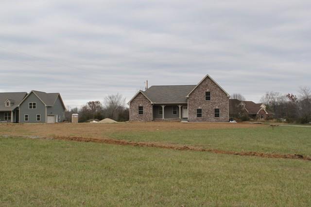 5548 Flewellyn Road Springfield, TN 37172 - Photo 3 of 16 a front view of house with yard and trees