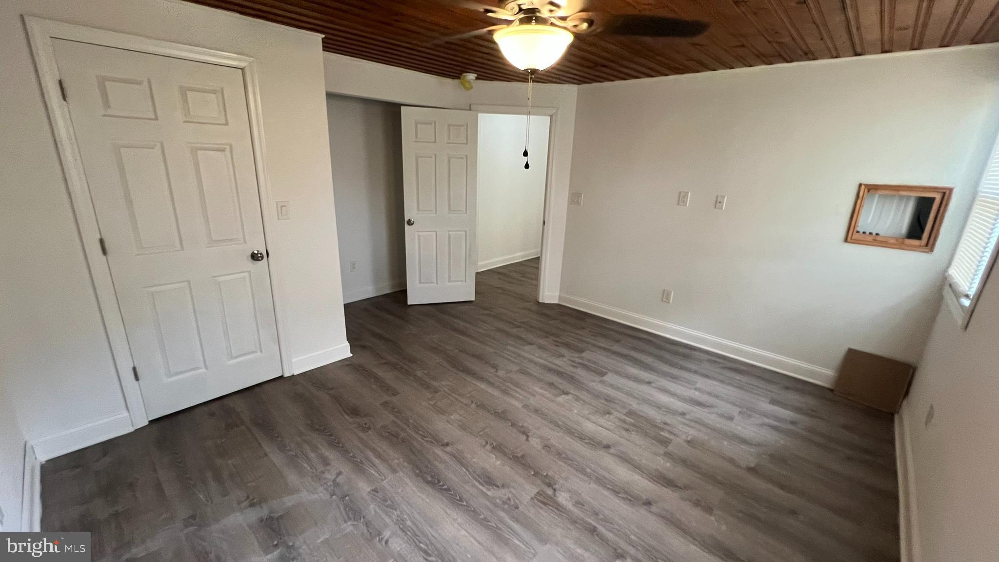 65 Egg Harbor Road, Unit A Berlin, NJ 08009 - Photo 11 of 15 a view of an empty room with wooden floor