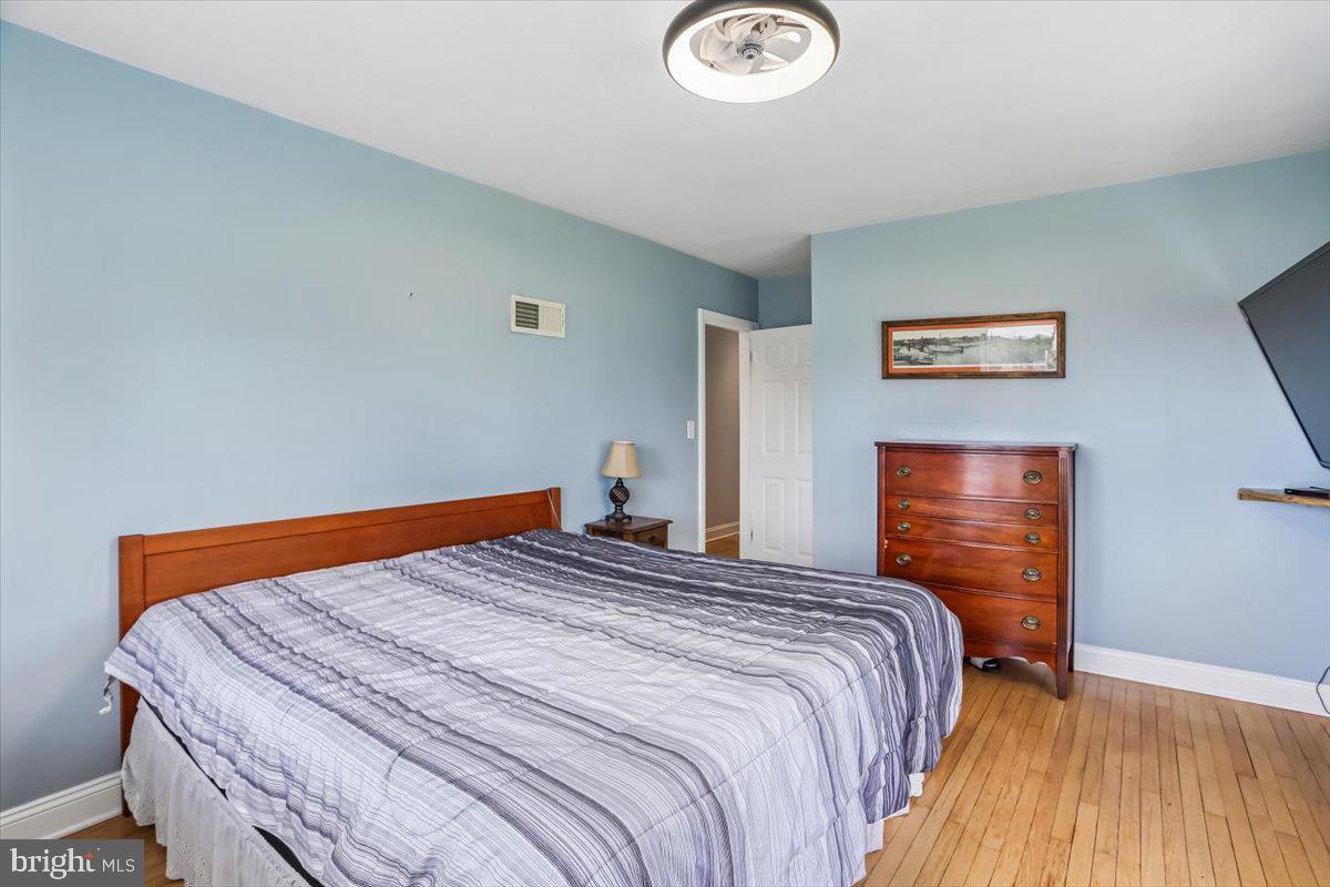 321 North 3rd Street Oakland, MD 21550 - Photo 23 of 48 a bedroom with a bed and a window