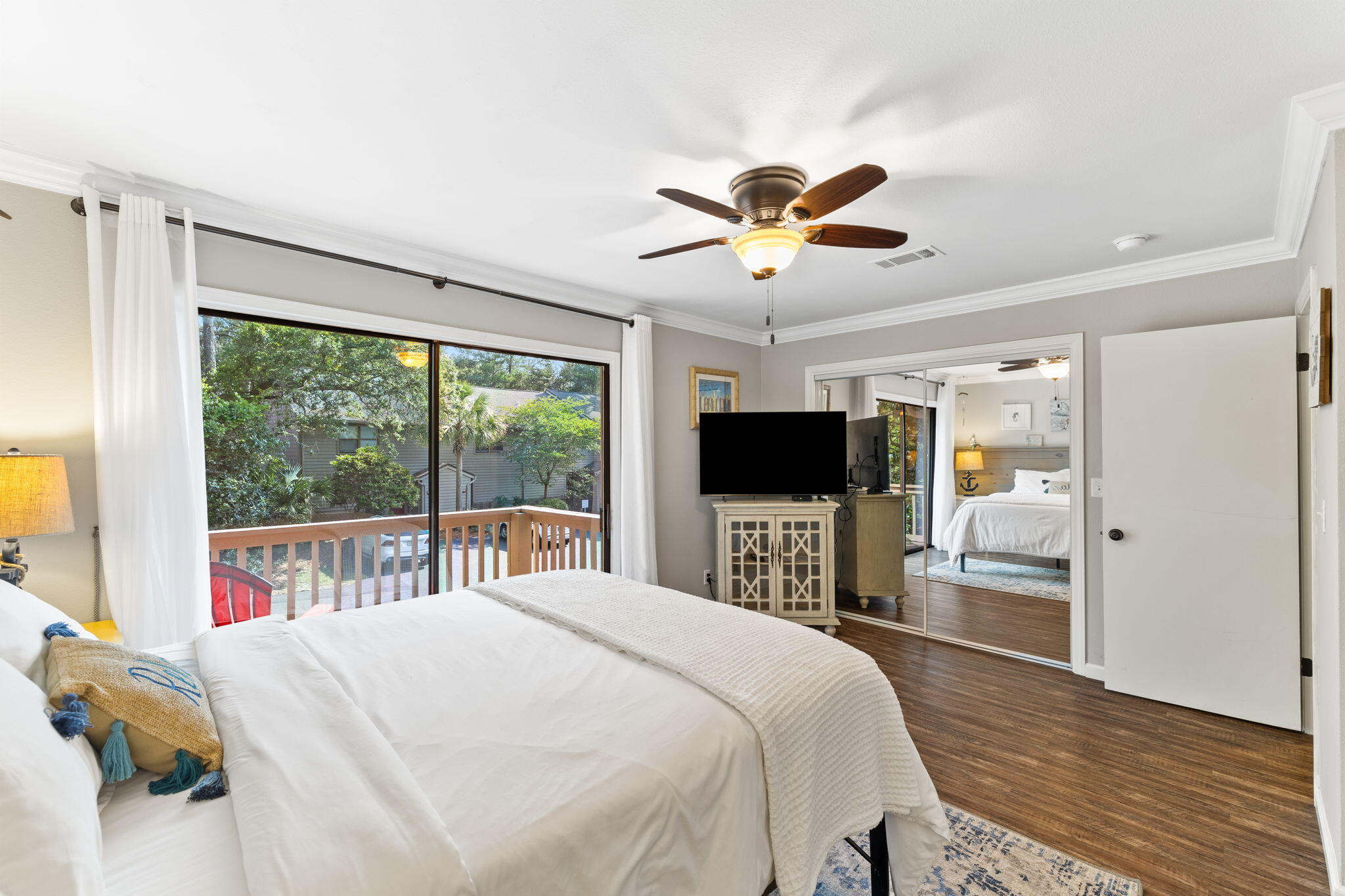 125 Cassine Garden Circle, Unit 129 Santa Rosa Beach, FL 32459 - Photo 18 of 70 a bedroom with a bed and a large window