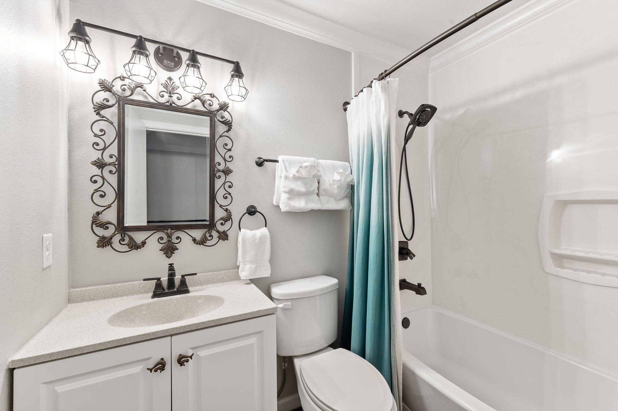 125 Cassine Garden Circle, Unit 129 Santa Rosa Beach, FL 32459 - Photo 28 of 70 a bathroom with a sink a toilet and shower
