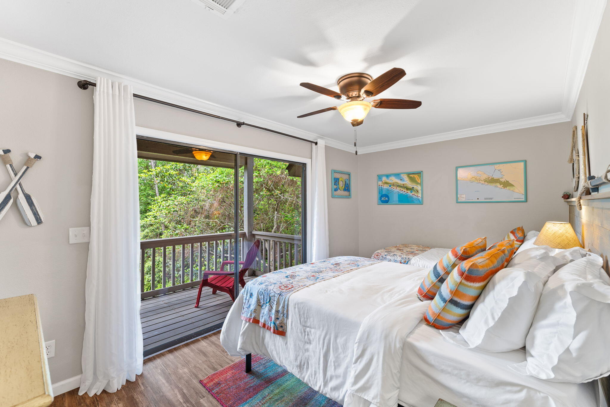 125 Cassine Garden Circle, Unit 129 Santa Rosa Beach, FL 32459 - Photo 29 of 70 a bedroom with a bed and a large window