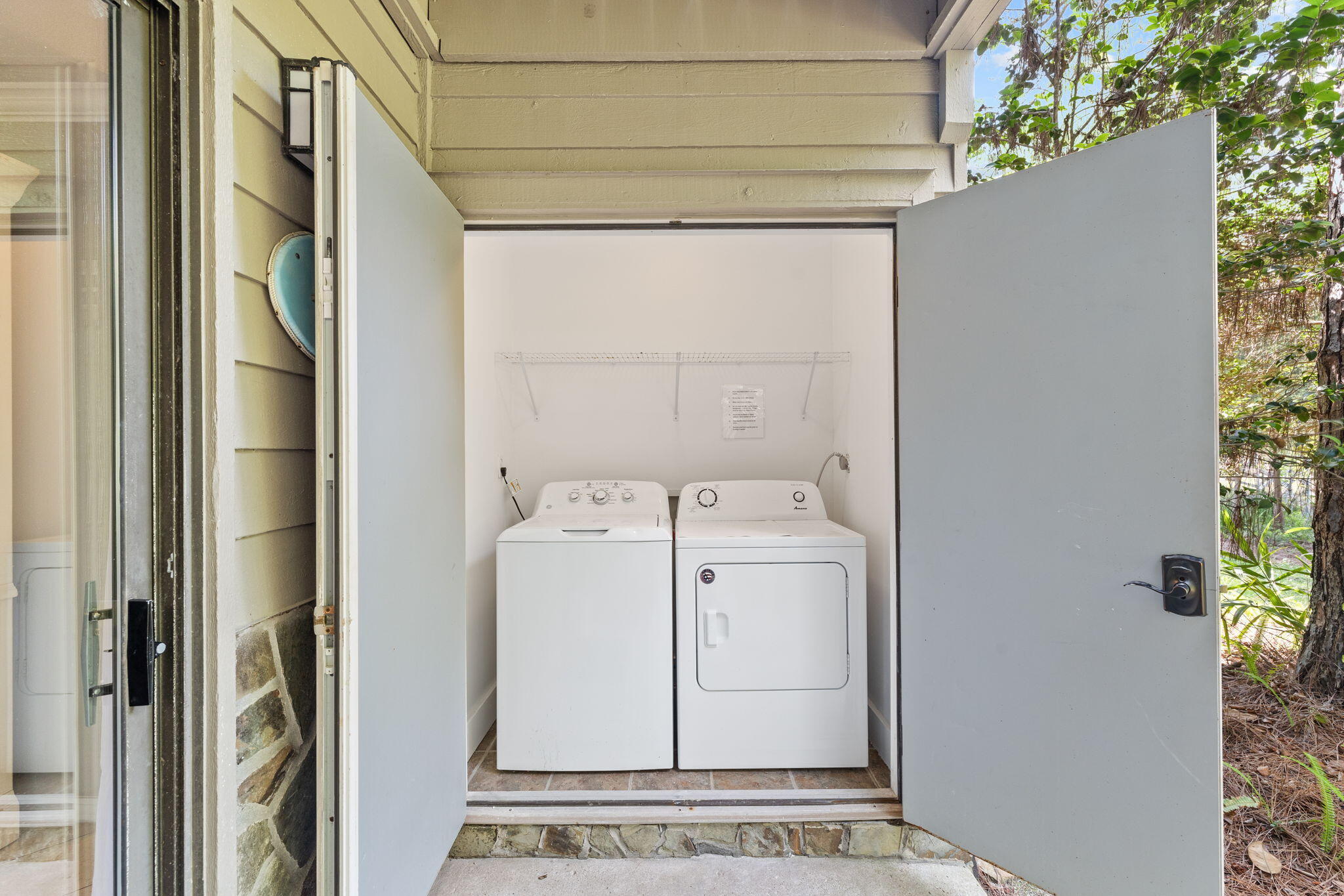 125 Cassine Garden Circle, Unit 129 Santa Rosa Beach, FL 32459 - Photo 32 of 70 a utility room with dryer and washer