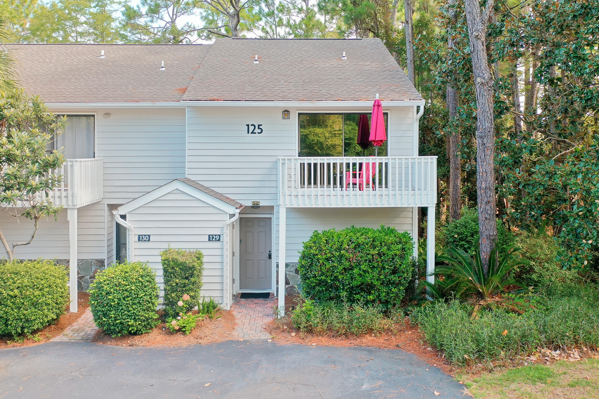 125 Cassine Garden Circle, Unit 129 Santa Rosa Beach, FL 32459 - Photo 70 of 70 front view of a house with a yard