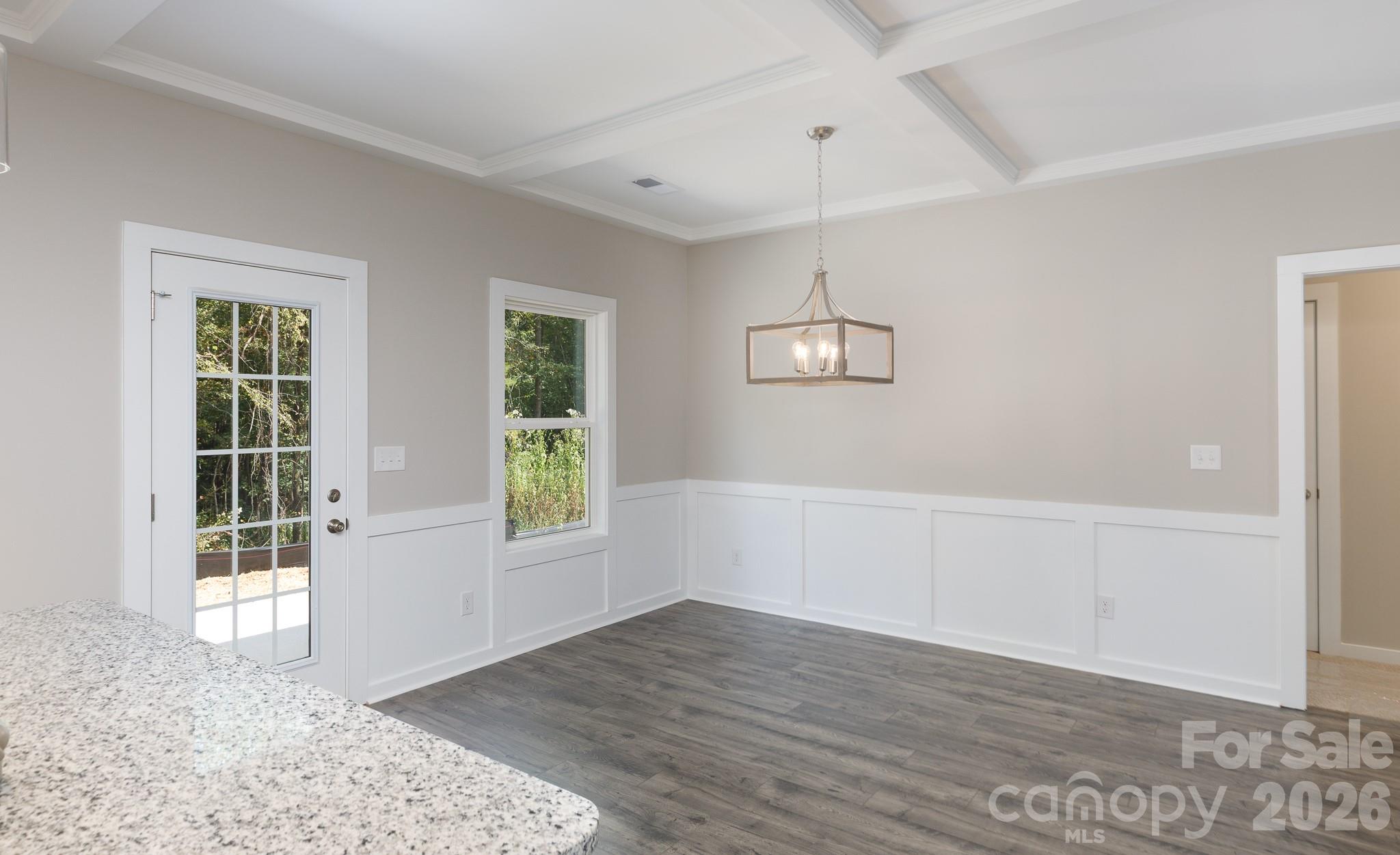 3339 Lesslie Highway, Unit 2 Rock Hill, SC 29730 - Photo 12 of 46 an empty room with wooden floor and windows
