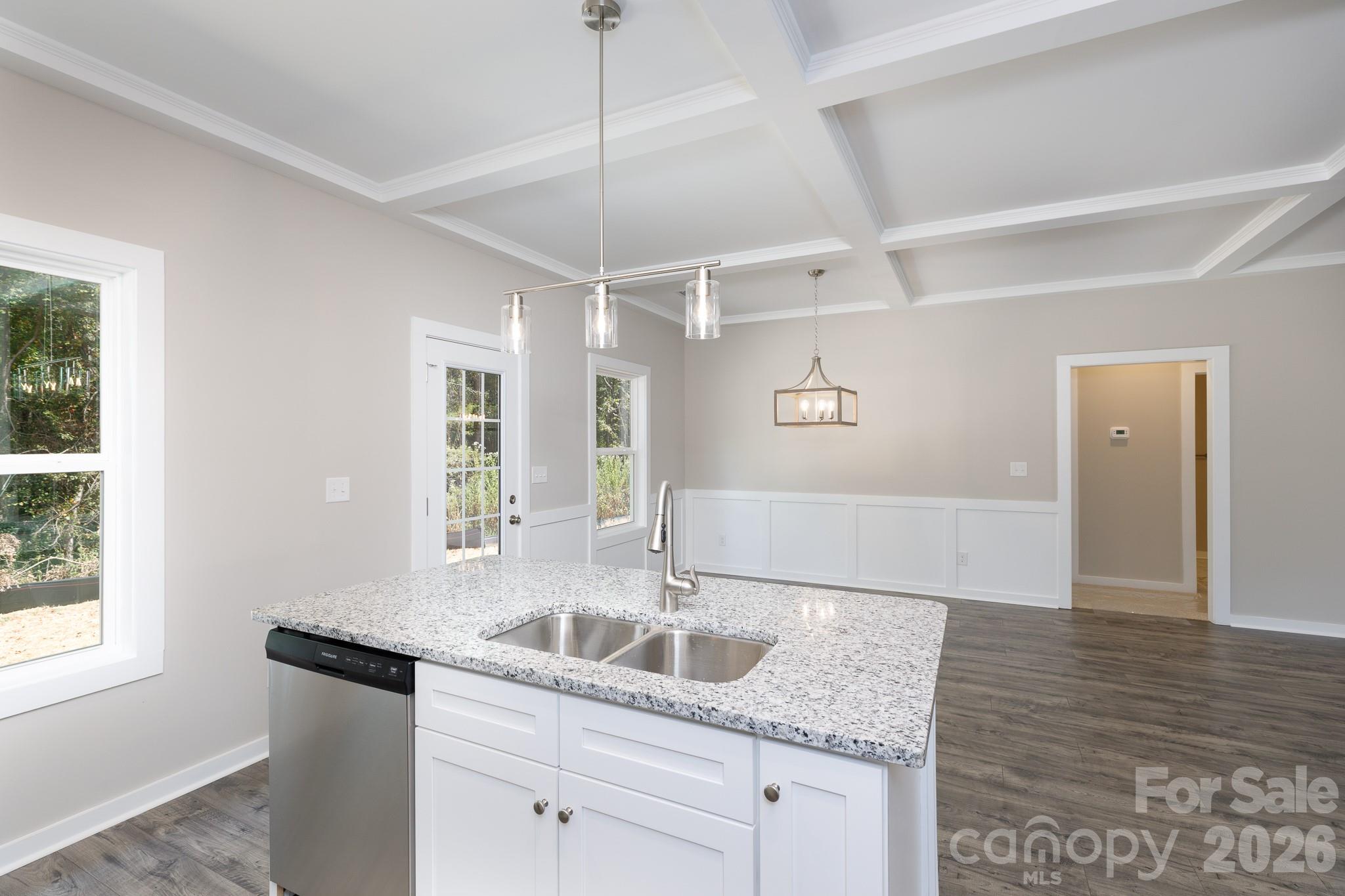 3339 Lesslie Highway, Unit 2 Rock Hill, SC 29730 - Photo 13 of 46 a kitchen with granite countertop a sink window and cabinets
