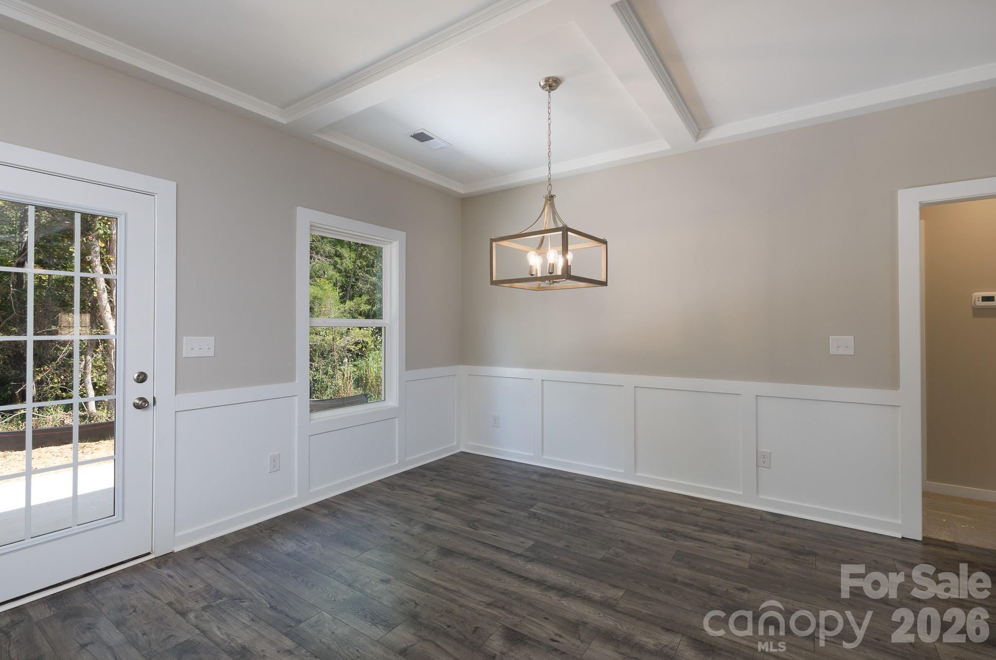 3339 Lesslie Highway, Unit 2 Rock Hill, SC 29730 - Photo 15 of 46 an empty room with wooden floor fan and windows