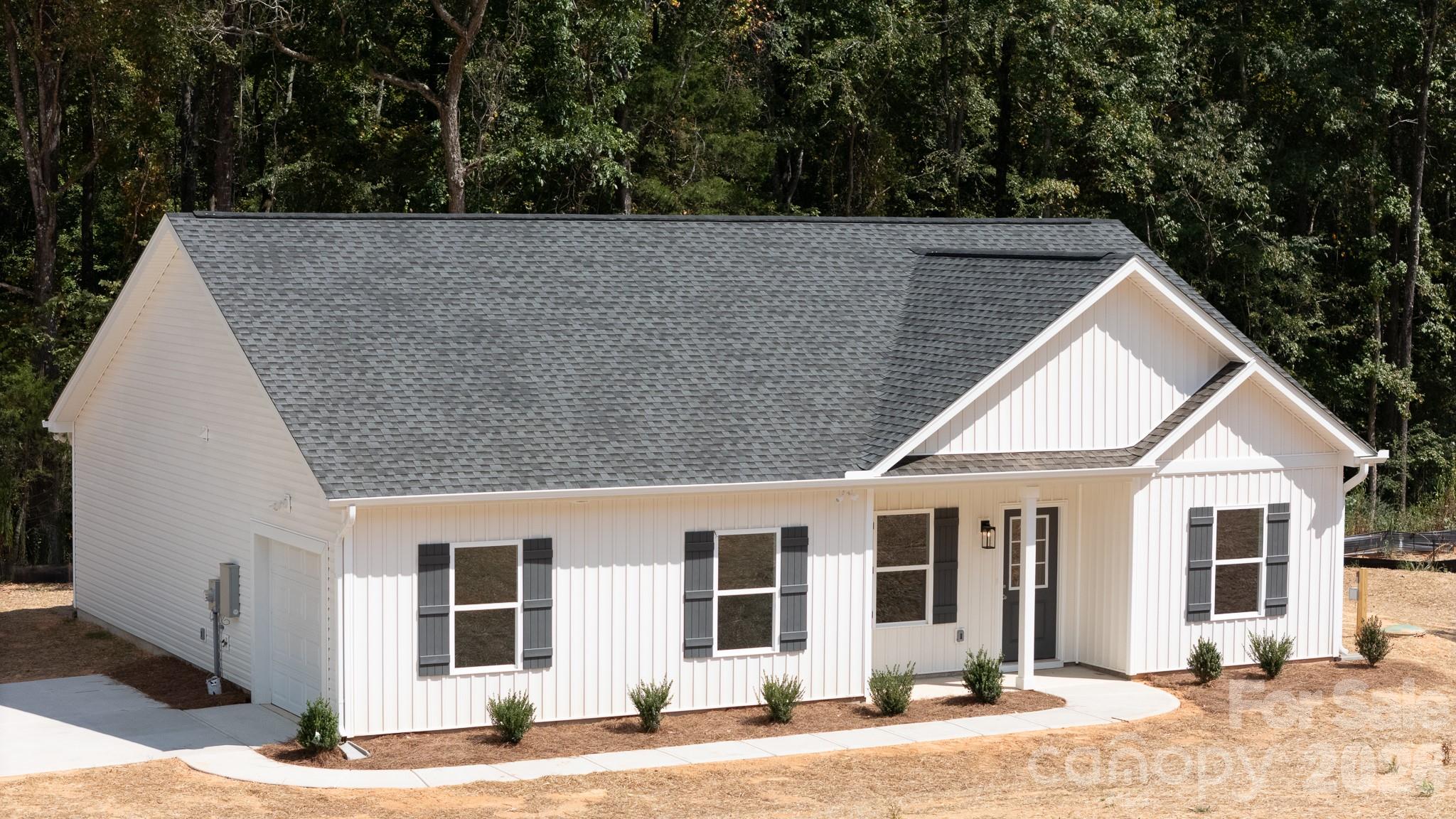 3339 Lesslie Highway, Unit 2 Rock Hill, SC 29730 - Photo 2 of 46 a view of a house with a patio
