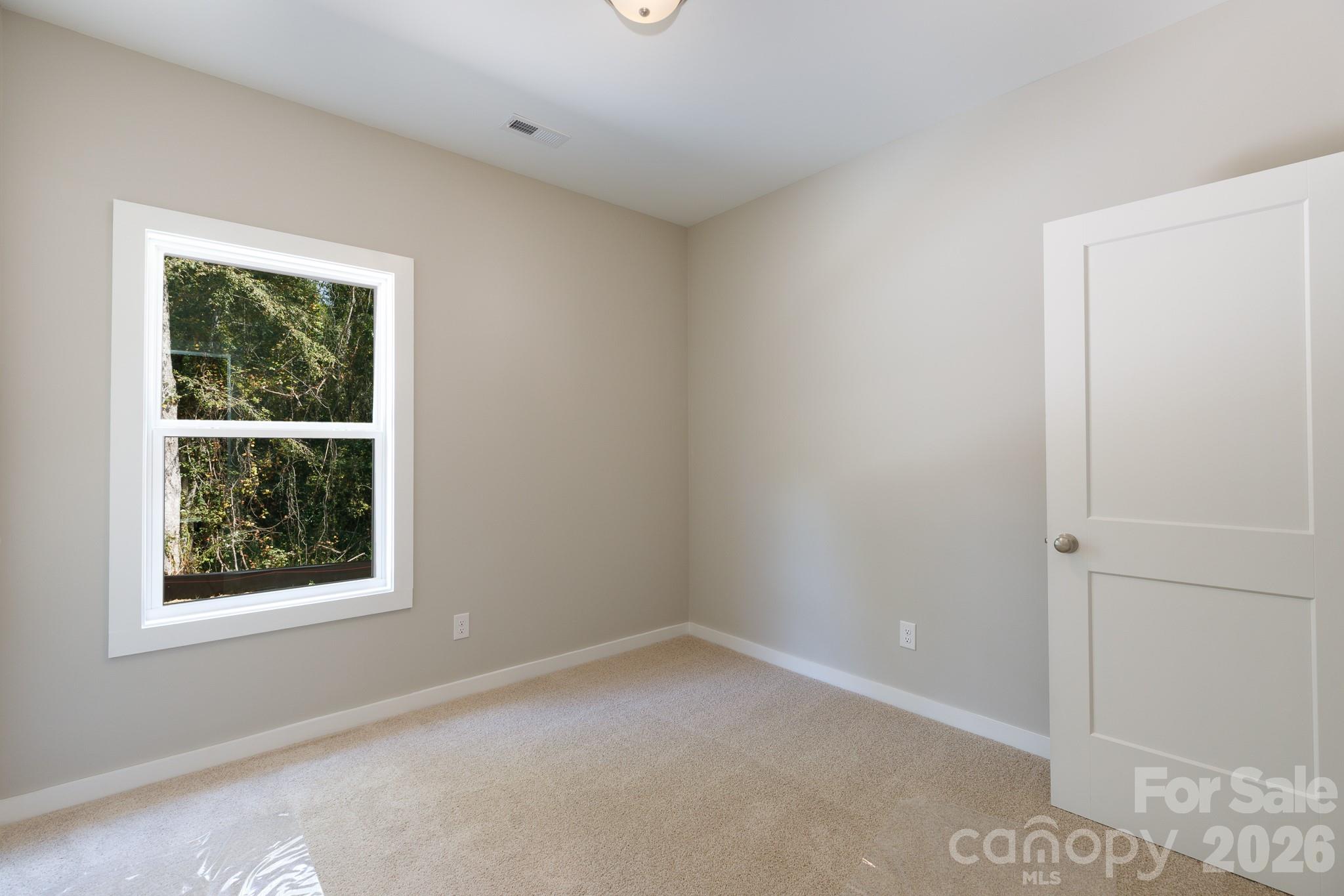 3339 Lesslie Highway, Unit 2 Rock Hill, SC 29730 - Photo 22 of 46 an empty room with a window