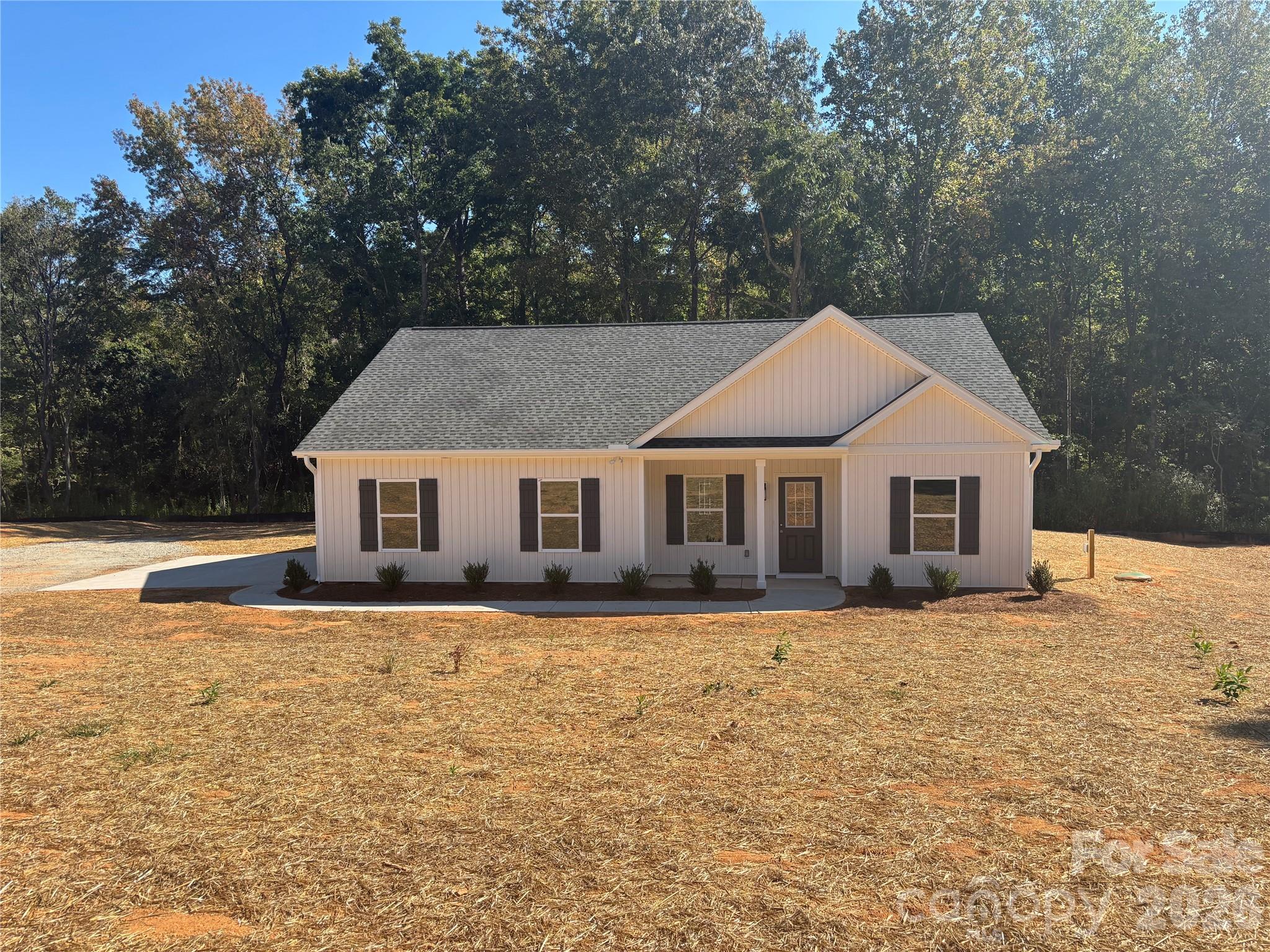 3339 Lesslie Highway, Unit 2 Rock Hill, SC 29730 - Photo 3 of 46 a front view of a house with a yard