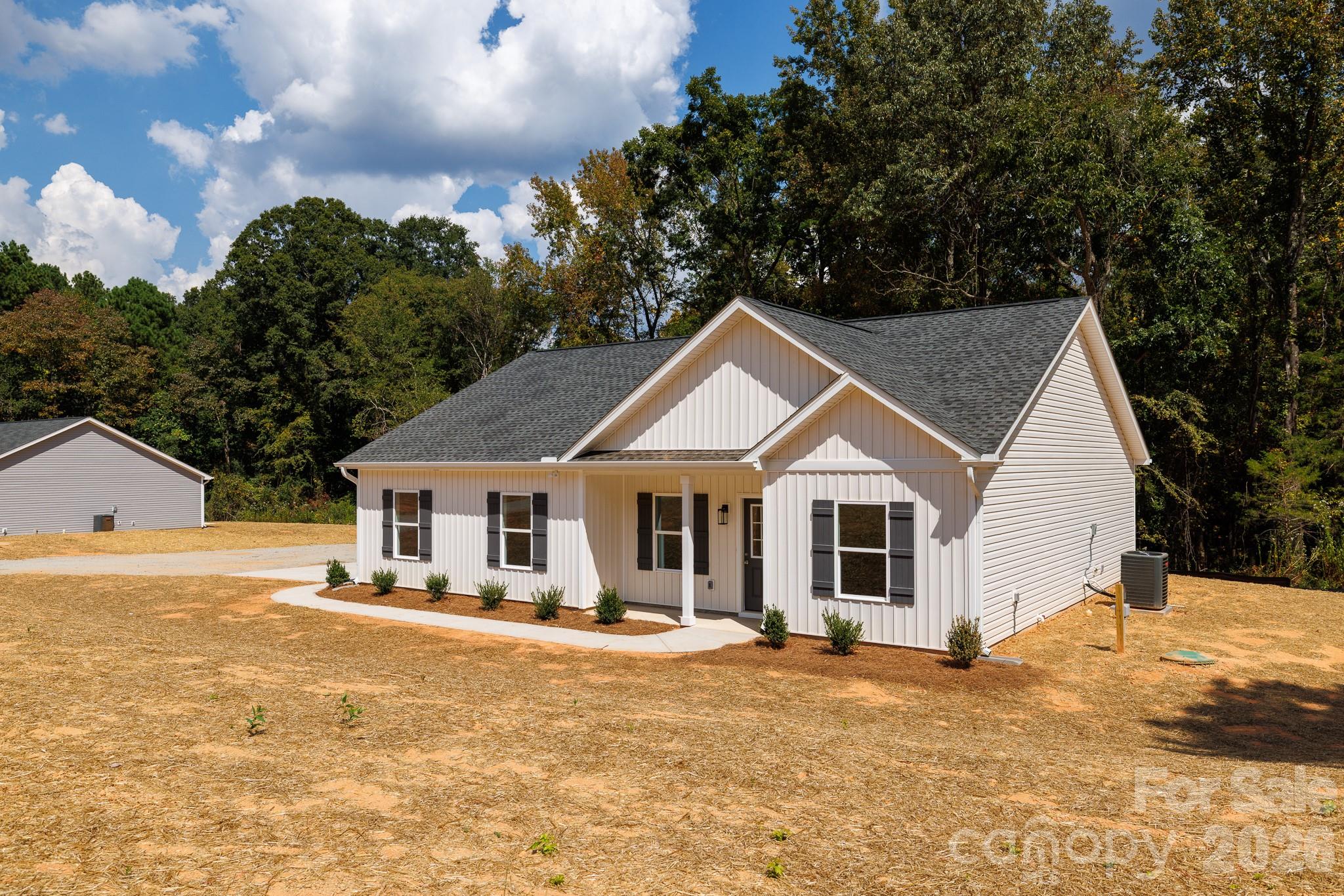 3339 Lesslie Highway, Unit 2 Rock Hill, SC 29730 - Photo 35 of 46 a front view of a house with a yard
