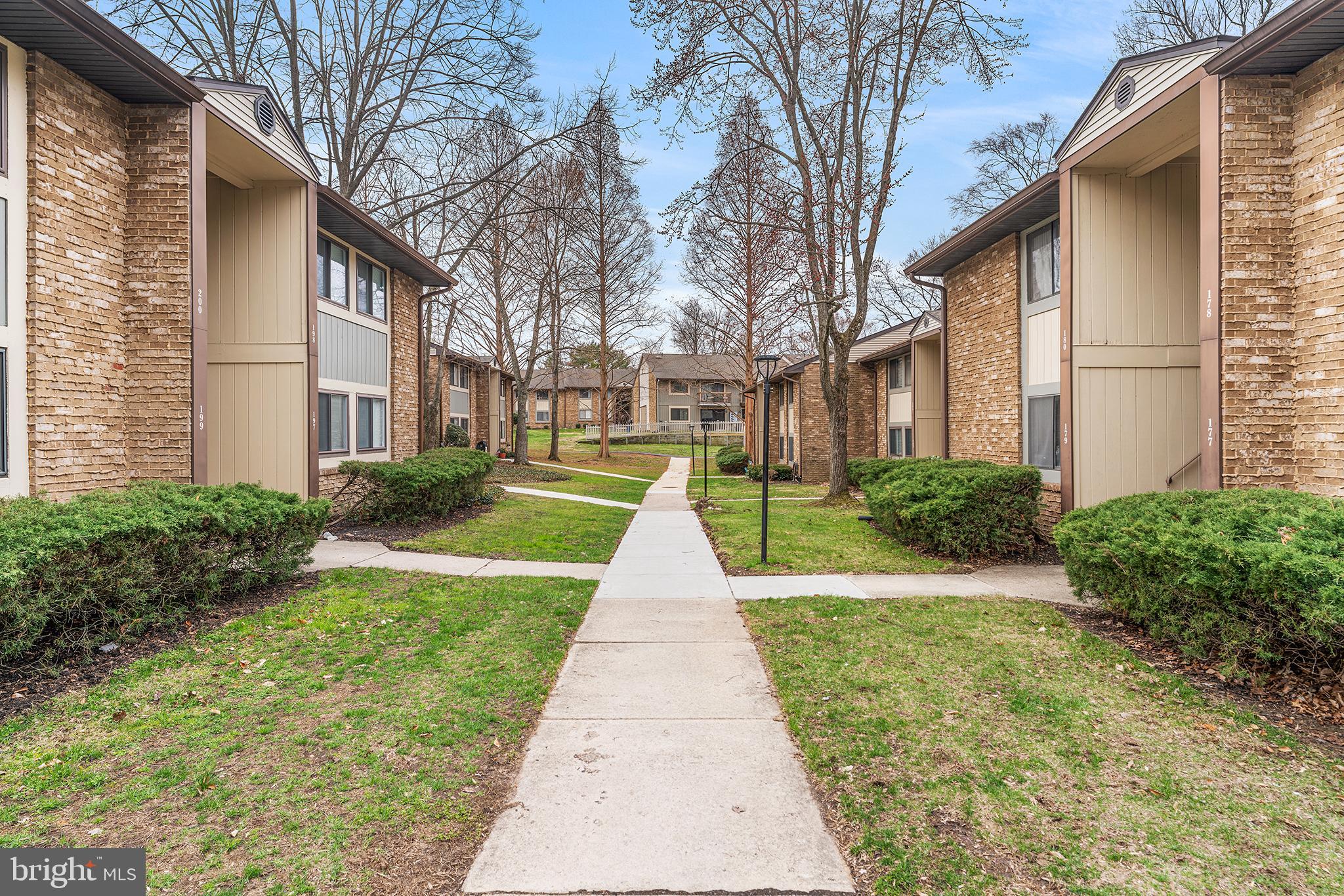 115 East Kings Highway, Unit 186 Maple Shade, NJ 08052 - Photo 24 of 25 a view of pathway with a house in the background
