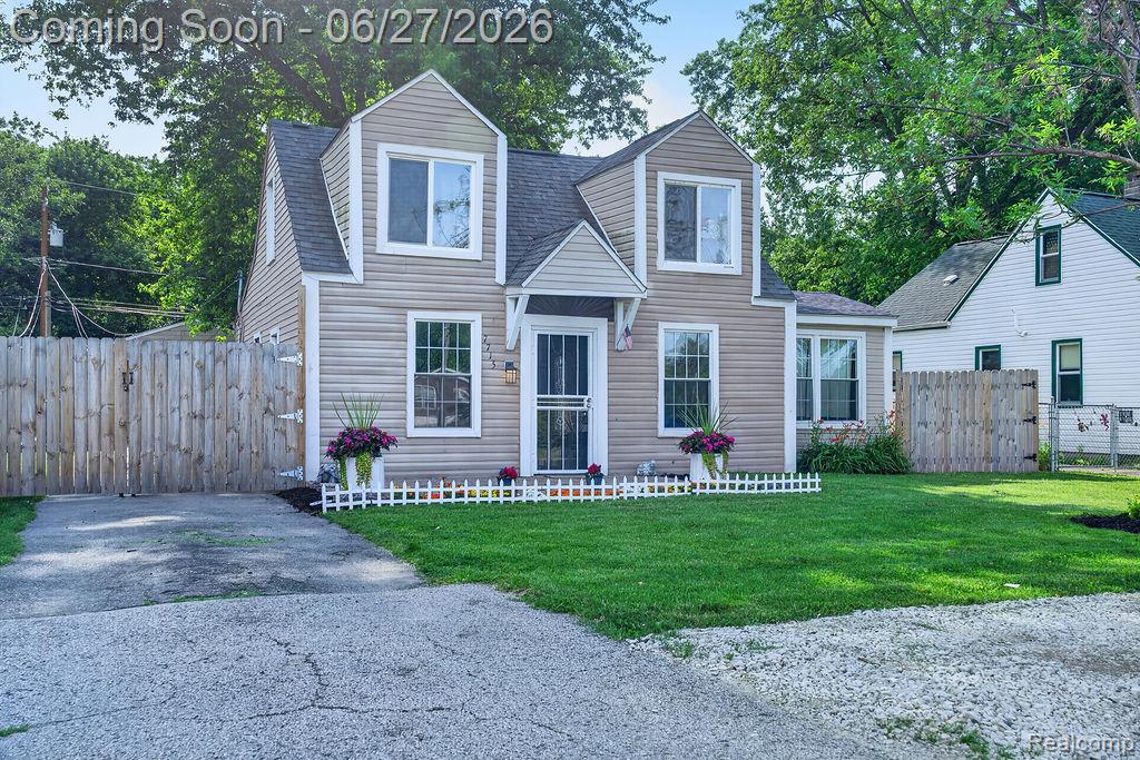 7715 Beech Daly Road Taylor, MI 48180 - Photo 4 of 21 Dormered facade with light-toned siding and white trim