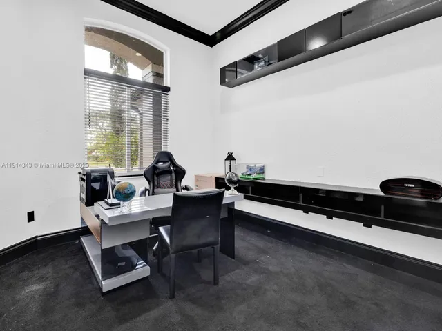 a view of swimming pool with a yard