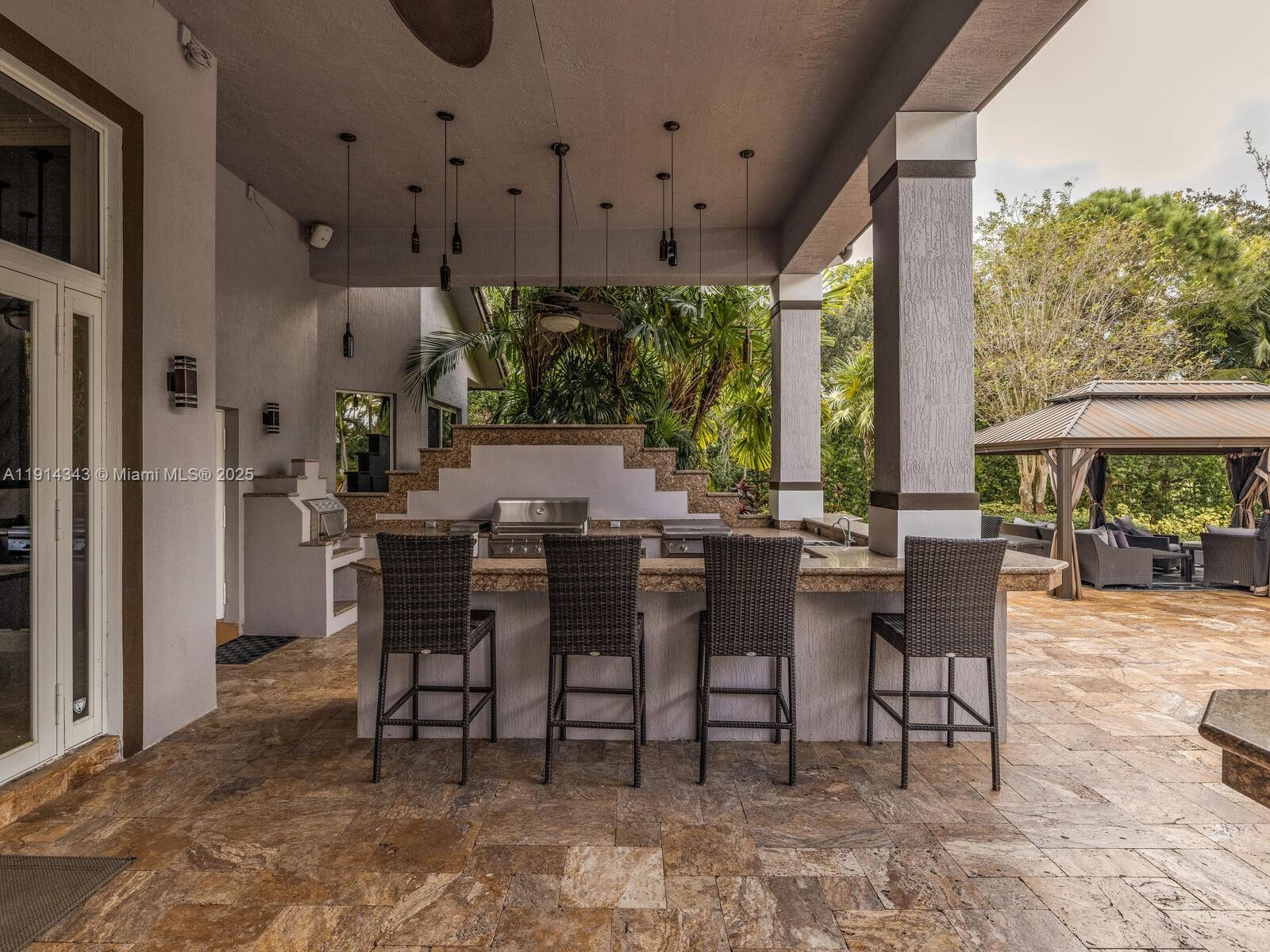 12995 Southwest 40 Street Davie, FL 33330 - Photo 67 of 79 a view of a dining room with furniture window and outside view