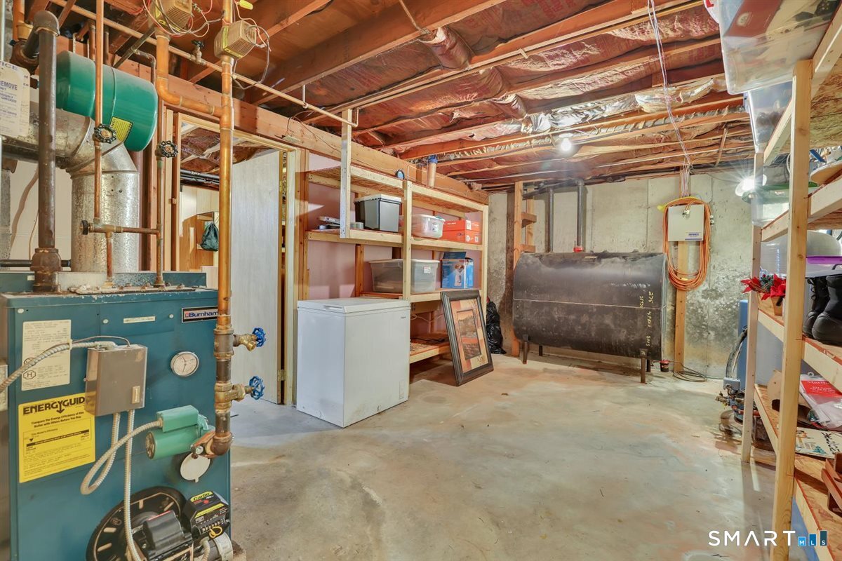 328 Bulkeley Hill Road Colchester, CT 06415 - Photo 27 of 40 Basement Offers Plenty of Storage