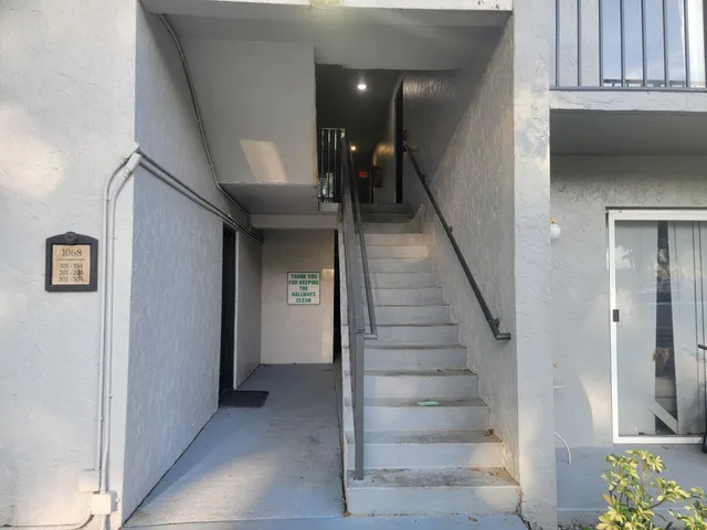 a view of a hallway with entryway