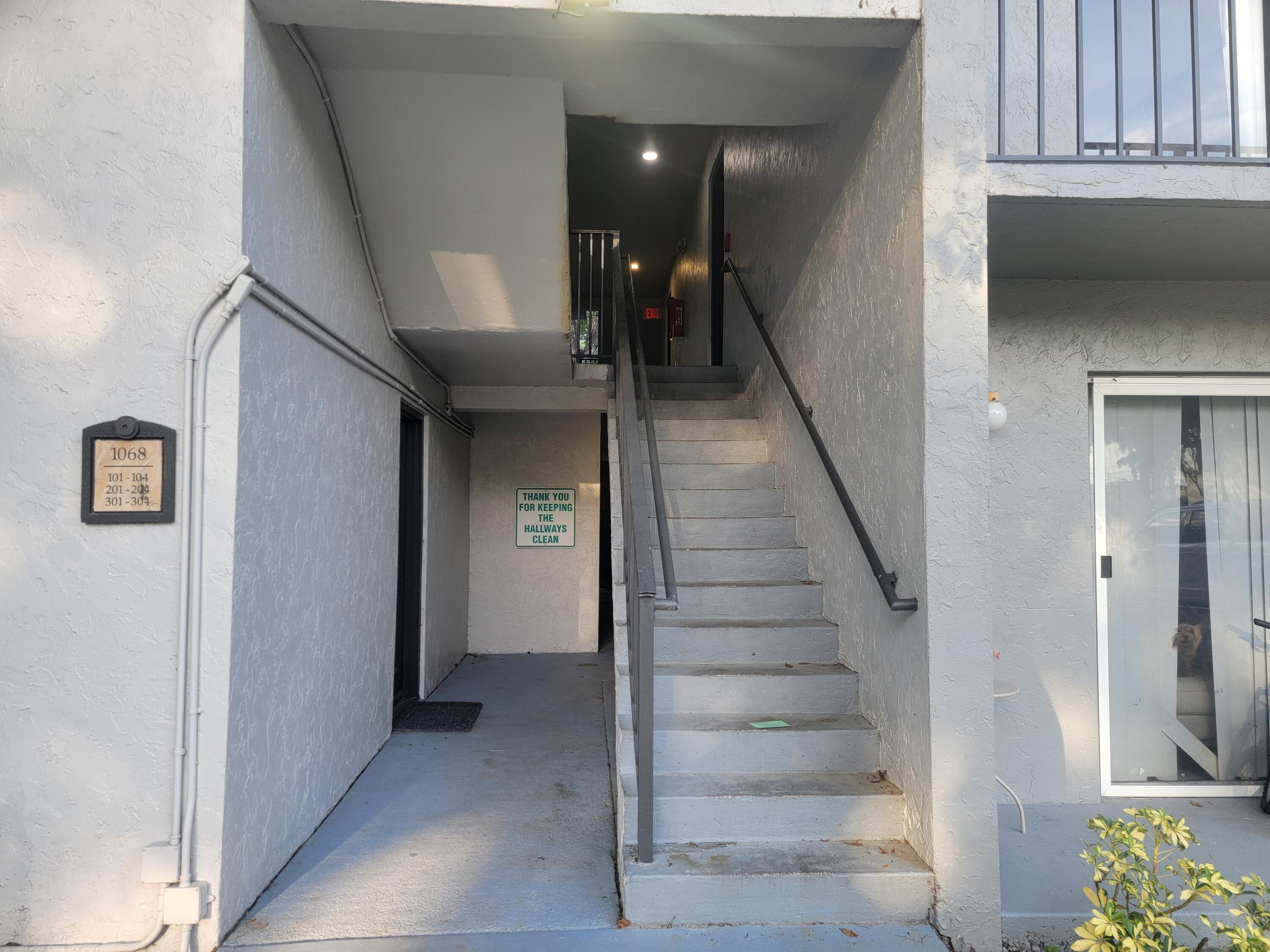 a view of a hallway with entryway