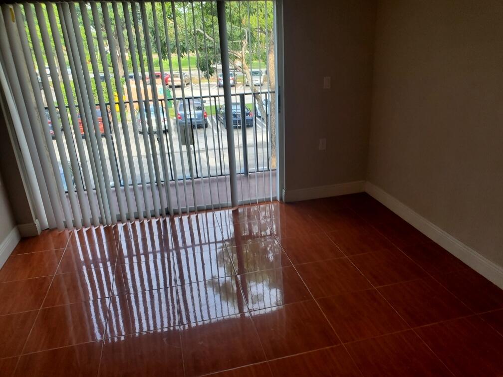 1068 Benoist Farms Road, Unit 204 West Palm Beach, FL 33411 - Photo 11 of 11 a view of a balcony