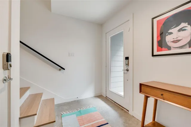 a view of front door with hallway