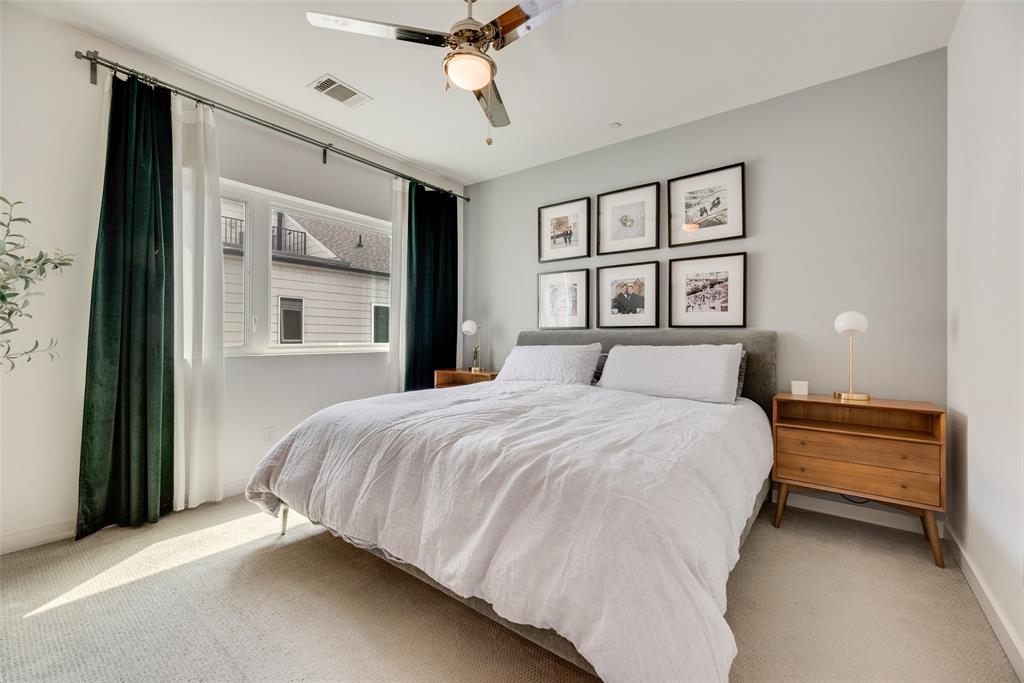 4705 Bryan Street, Unit 302 Dallas, TX 75204 - Photo 23 of 28 a bedroom with a bed and a window