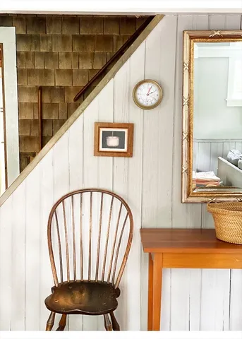 a bedroom with bed and window