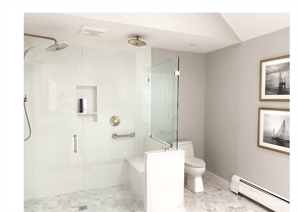 7 North Liberty Street Nantucket, MA 02554 - Photo 17 of 28 a bathroom with a toilet sink and shower