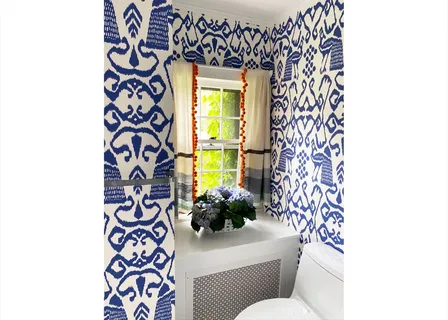 a bathroom with a sink mirror and shower