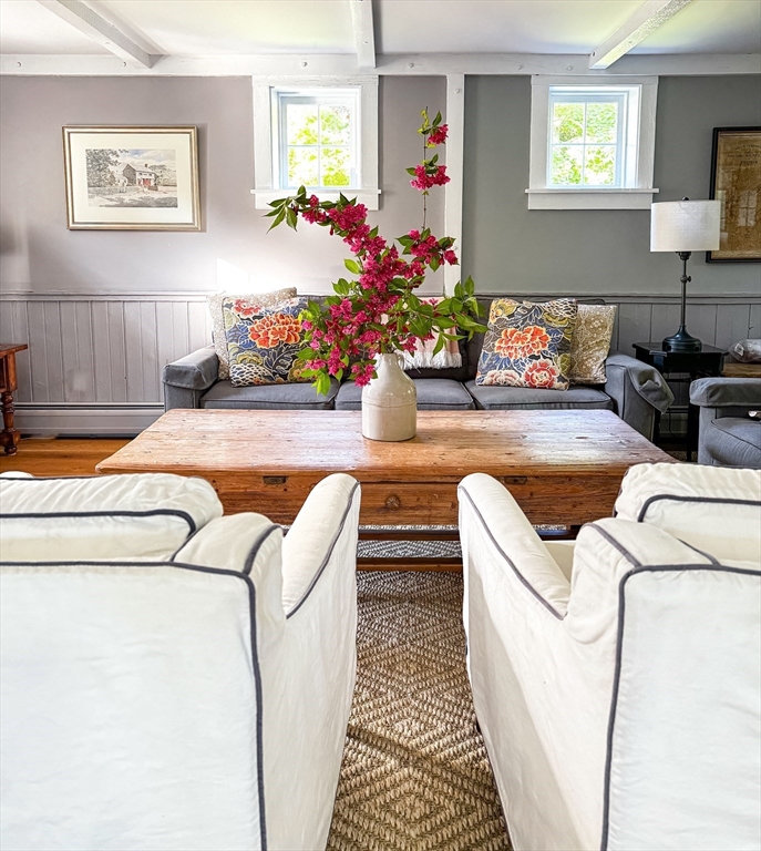 7 North Liberty Street Nantucket, MA 02554 - Photo 8 of 28 a living room with furniture and a table
