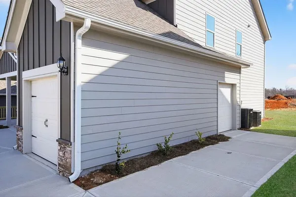 a view of a house with a garage