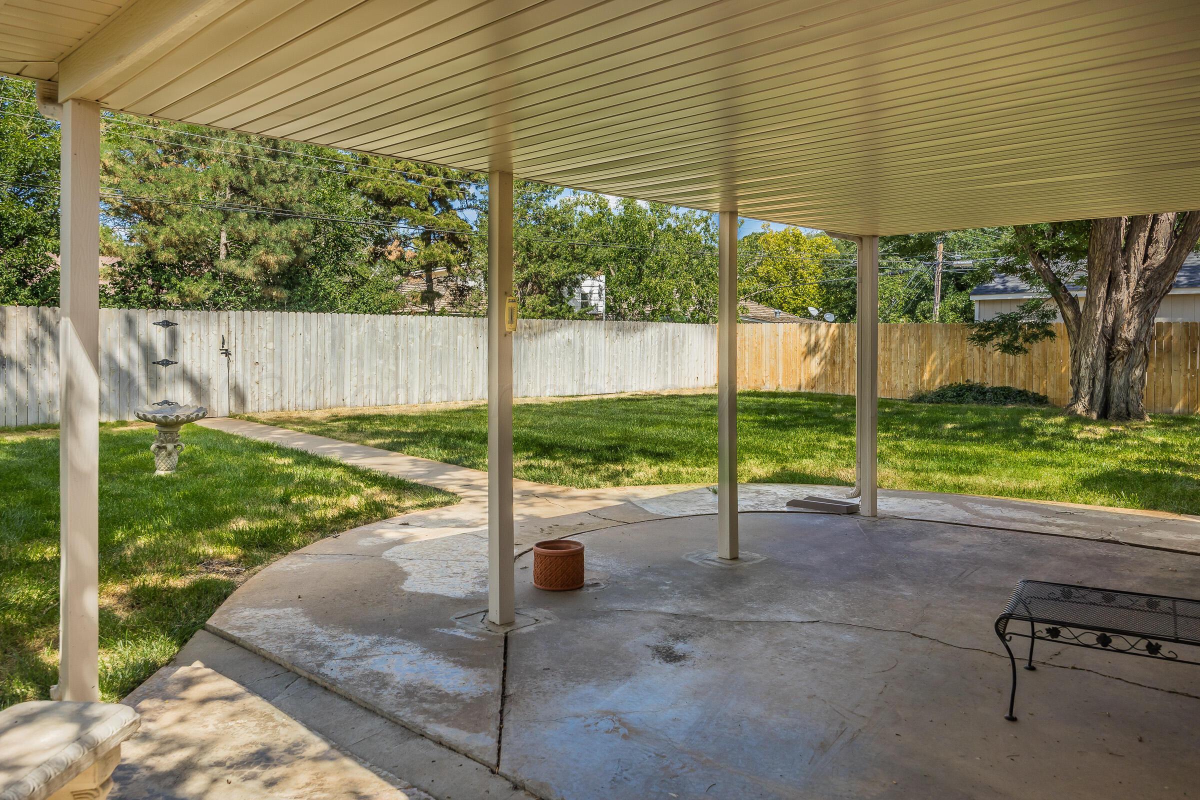 5502 Brinkman Drive Amarillo, TX 79106 - Photo 21 of 22 a view of a house with backyard and porch