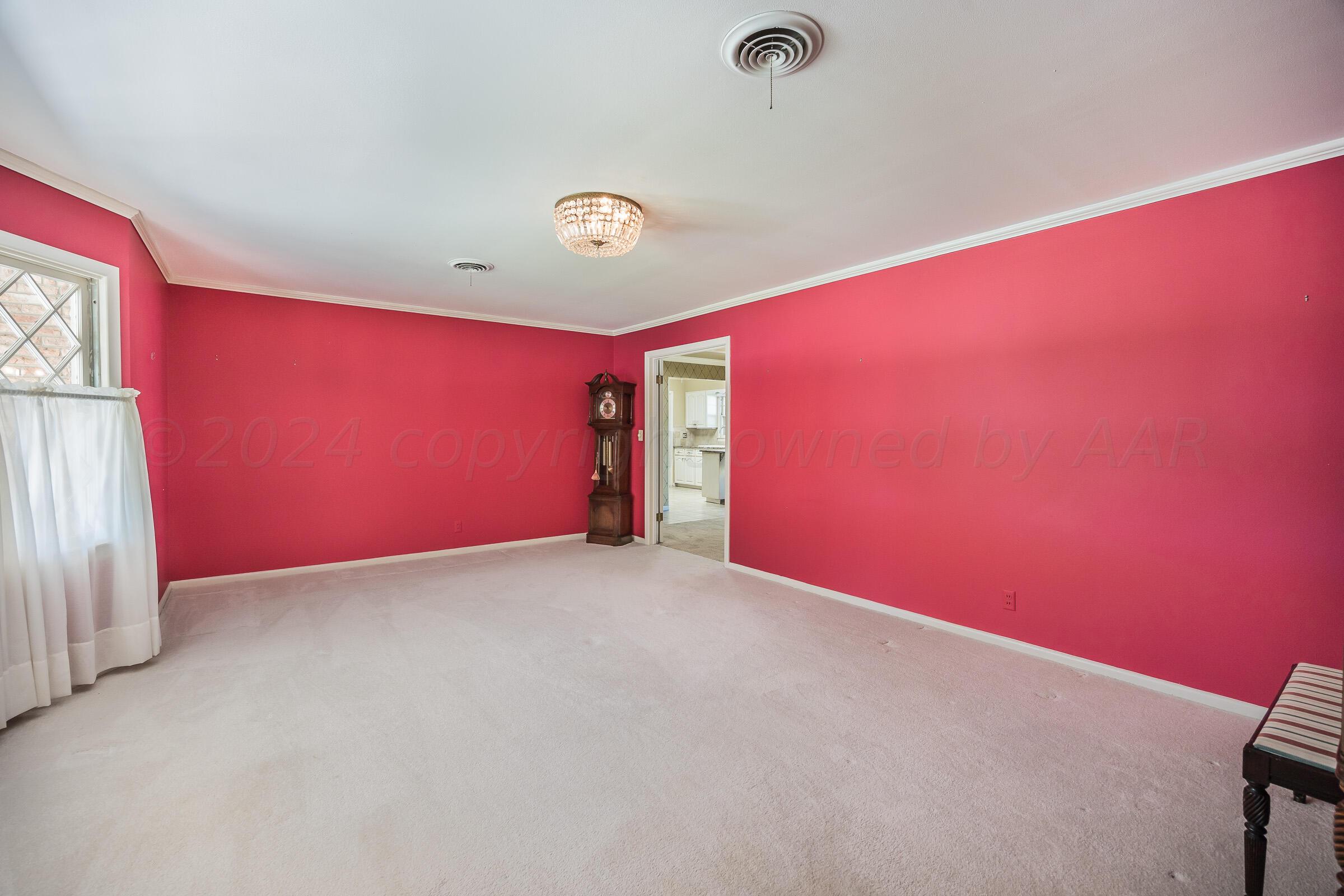 5502 Brinkman Drive Amarillo, TX 79106 - Photo 5 of 22 an empty room with windows