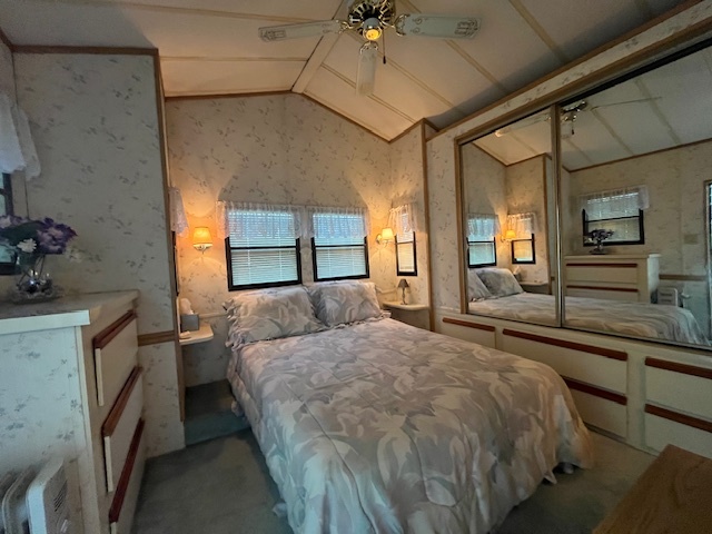 2795 East 28th Road Marseilles, IL 61341 - Photo 15 of 58 a bedroom with a bed and a large mirror on the dresser