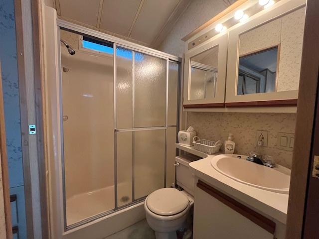 2795 East 28th Road Marseilles, IL 61341 - Photo 16 of 58 a bathroom with a sink toilet and shower