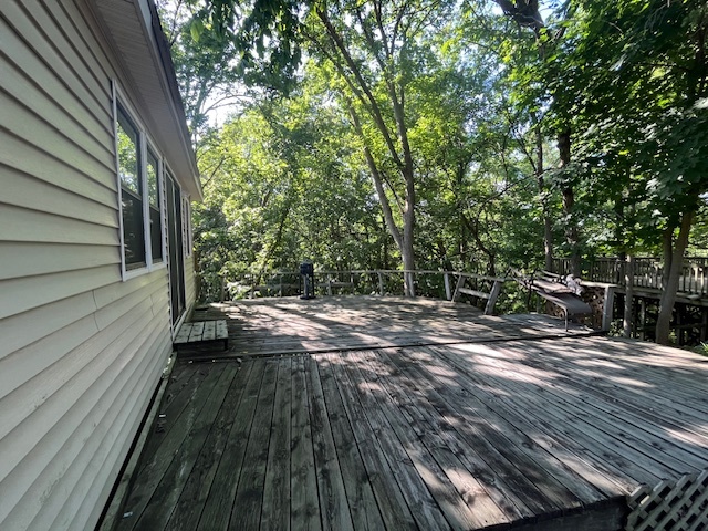 2795 East 28th Road Marseilles, IL 61341 - Photo 18 of 58 a view of backyard with wooden floor and outdoor seating
