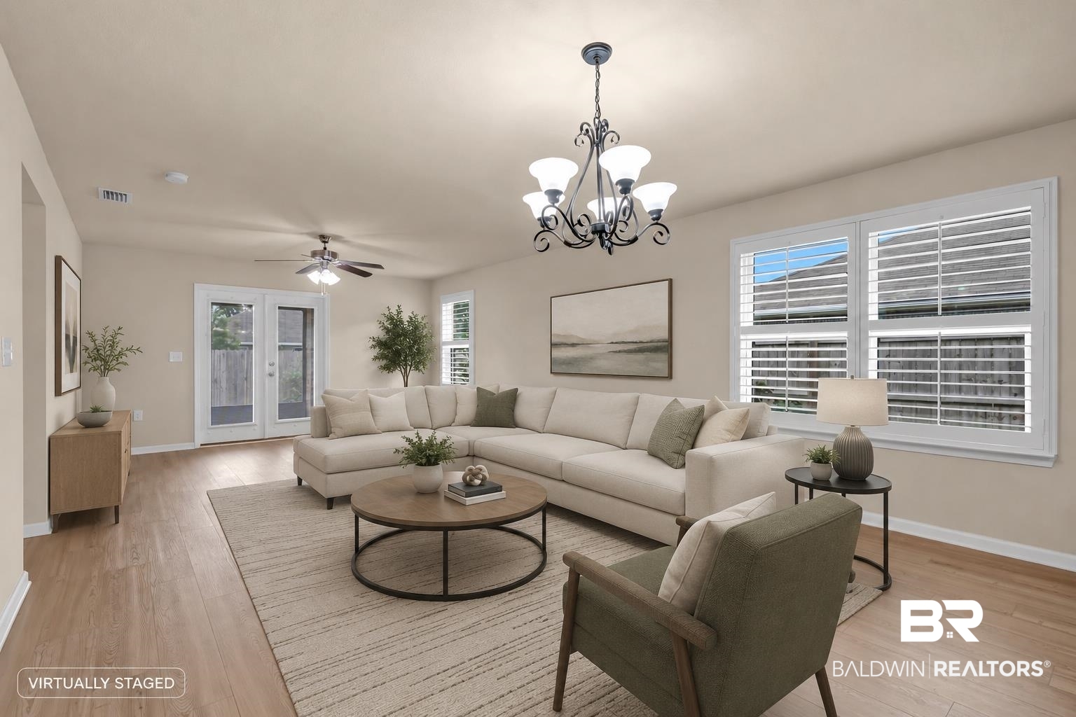 1704 Abbey Loop Foley, AL 36535 - Photo 16 of 38 Open-concept living space featuring wood-finish flooring, a contemporary chandelier, and recessed lighting