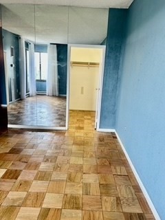40 Village Road, Unit 1704 (PH4) Middleton, MA 01949 - Photo 18 of 35 a view of hallway with a rug and a window
