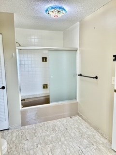 40 Village Road, Unit 1704 (PH4) Middleton, MA 01949 - Photo 22 of 35 a bathroom with a bathtub and a shower
