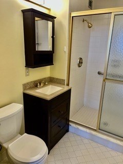 40 Village Road, Unit 1704 (PH4) Middleton, MA 01949 - Photo 25 of 35 a bathroom with a sink vanity mirror and toilet