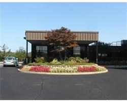 40 Village Road, Unit 1704 (PH4) Middleton, MA 01949 - Photo 3 of 35 a front view of a house with a yard and garage