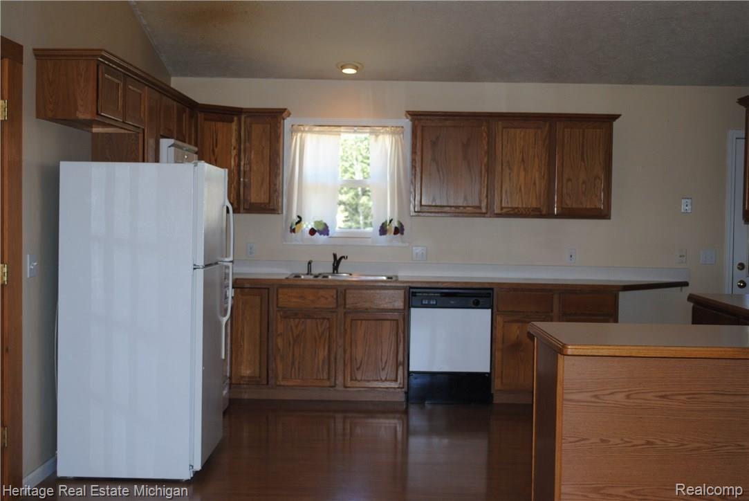 4354 Crandall Road Howell, MI 48855 - Photo 5 of 17 The heart of this home is the enormous kitchen, dining room and great room!