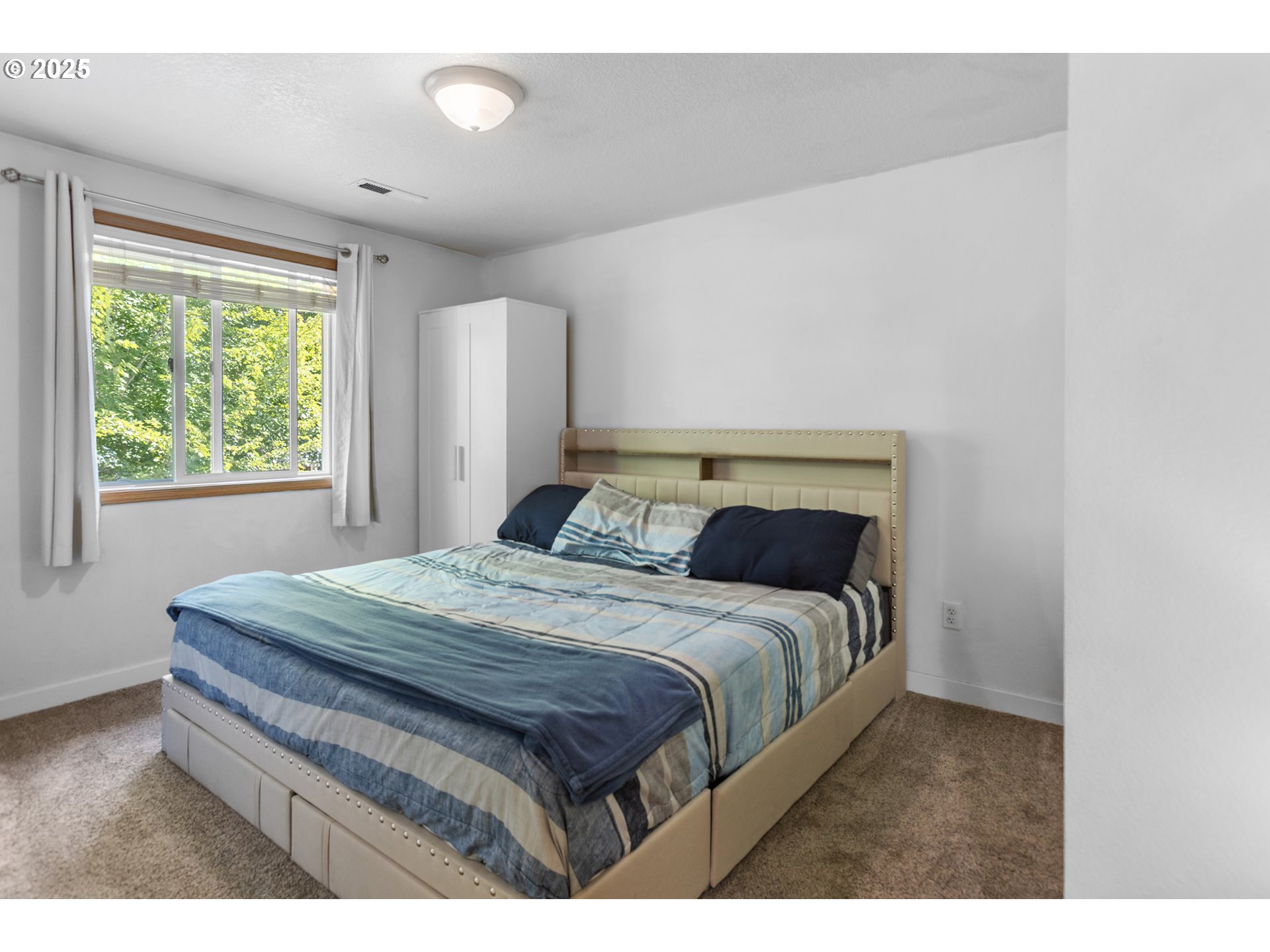 12 Southeast 9th Circle Battle Ground, WA 98604 - Photo 25 of 33 a bedroom with a bed and a window