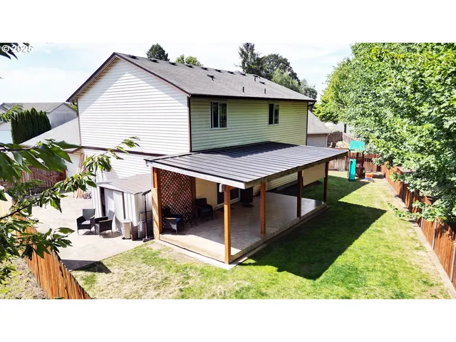 a view of a backyard with a garden