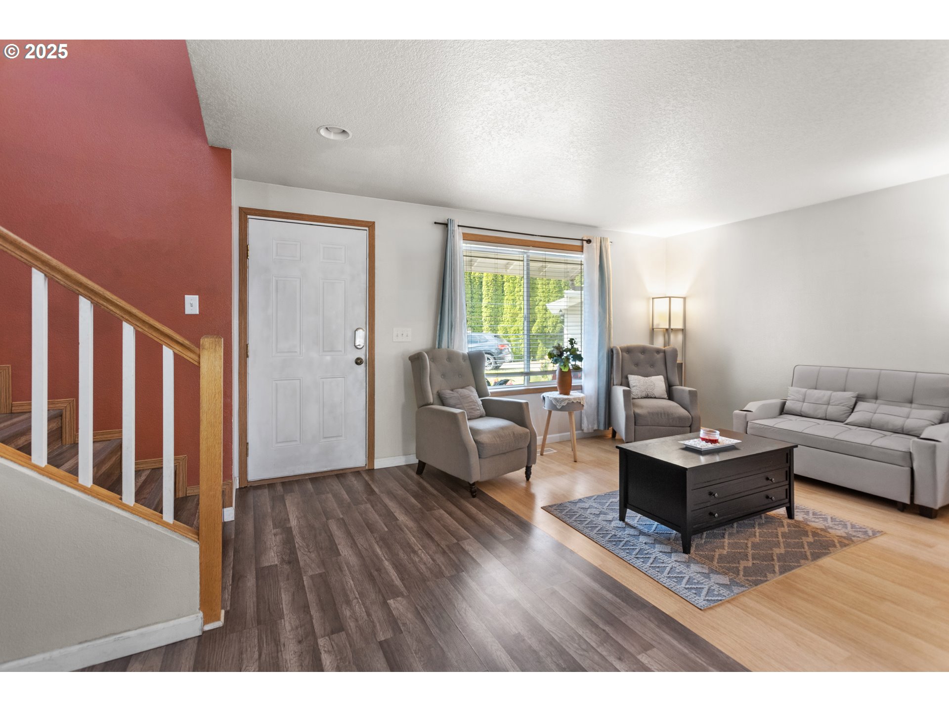 12 Southeast 9th Circle Battle Ground, WA 98604 - Photo 3 of 33 a living room with furniture and a wooden floor