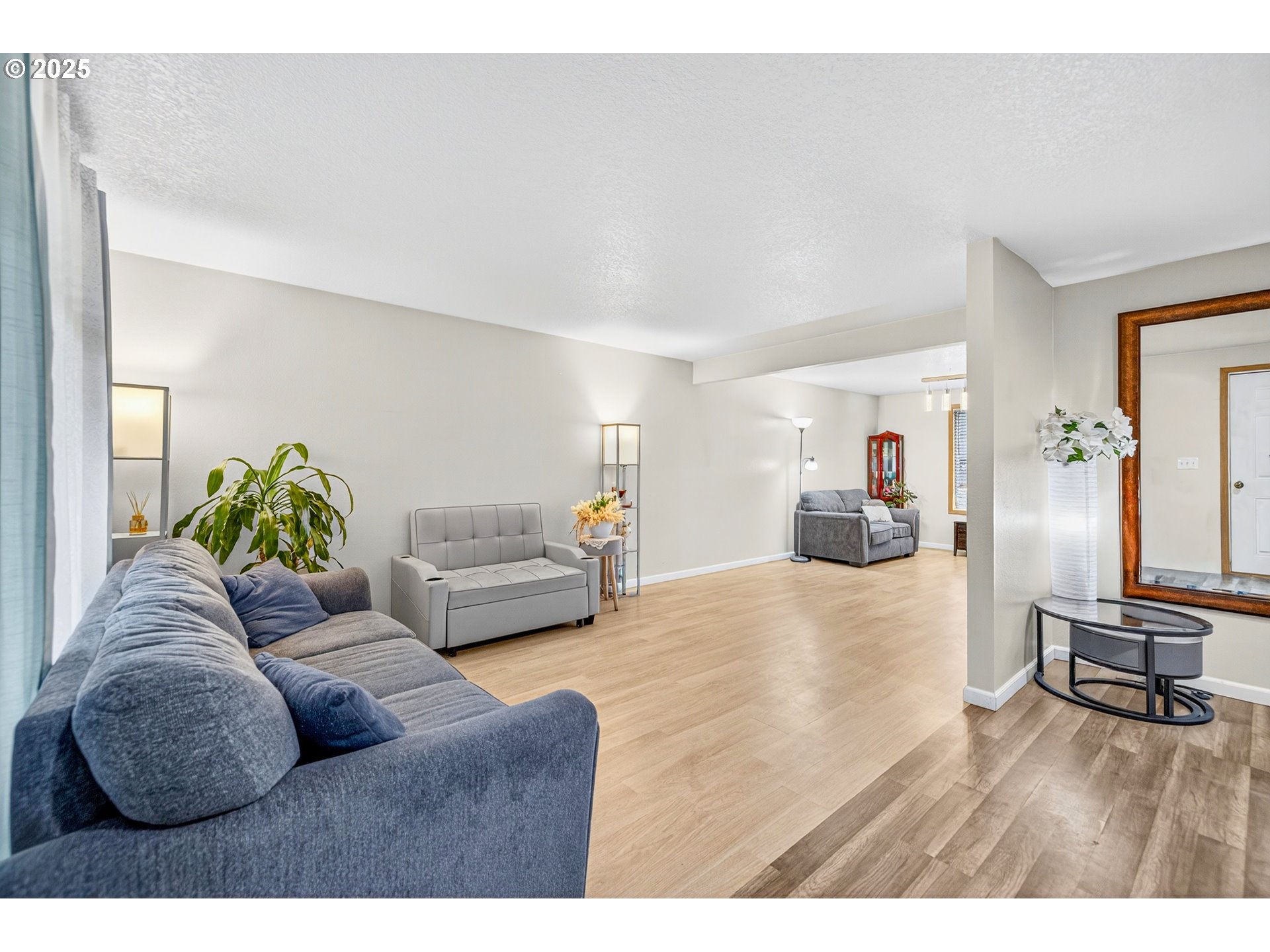 12 Southeast 9th Circle Battle Ground, WA 98604 - Photo 32 of 33 a living room with furniture and wooden floor