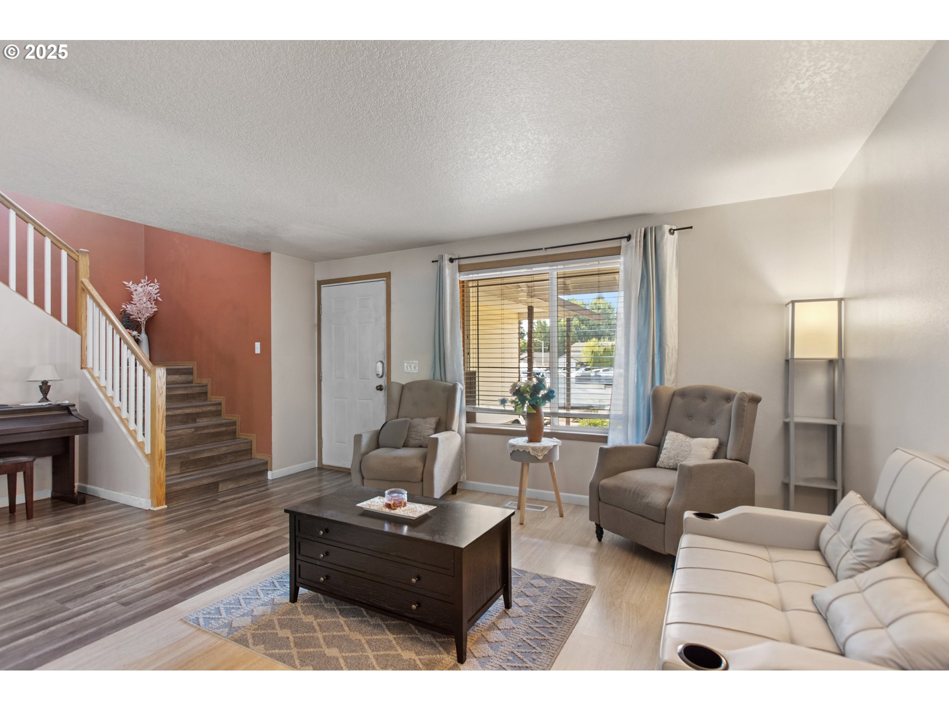 12 Southeast 9th Circle Battle Ground, WA 98604 - Photo 4 of 33 a living room with furniture rug and wooden floor