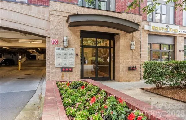 a front view of a building with an outdoor seating