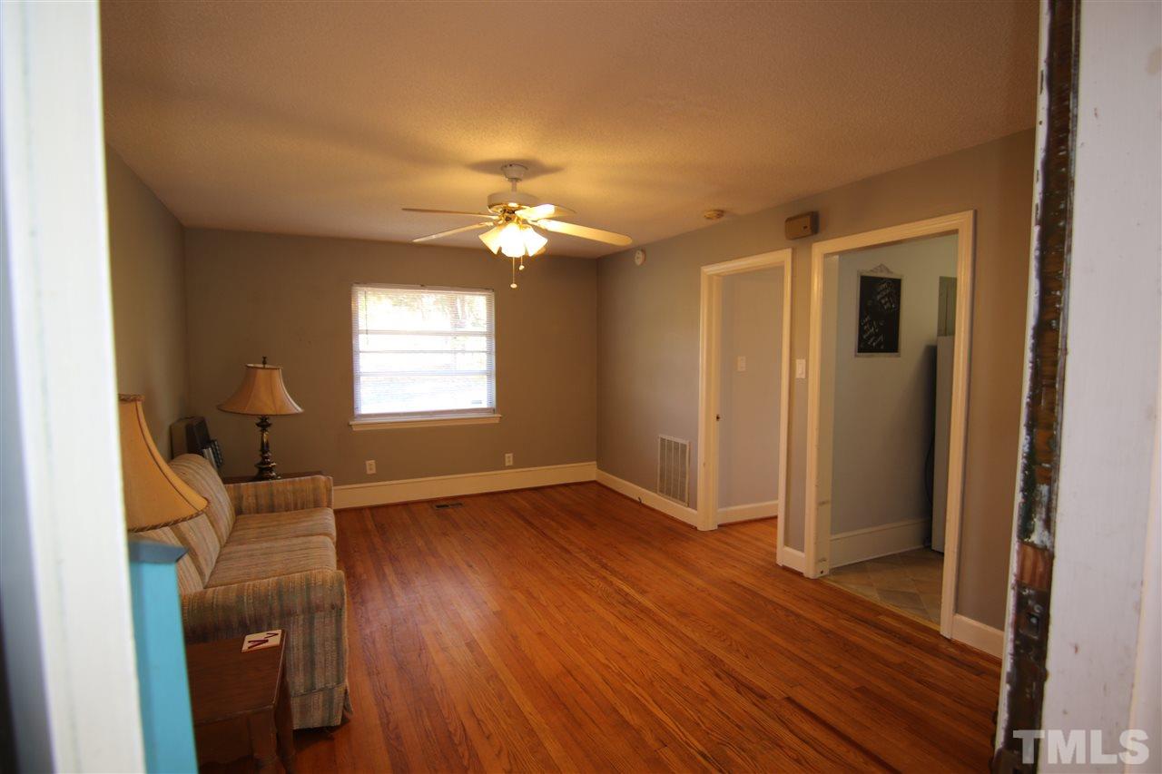 3507 Pickett Road Durham, NC 27705 - Photo 6 of 30 In-Law Suite or One Bedroom Apartment features a Living Room, Full Kitchen with Washer & Dryer, Hardwood Floors, Bedroom and Full Bath. A Great In-Law Suite or Rental Opportunity.